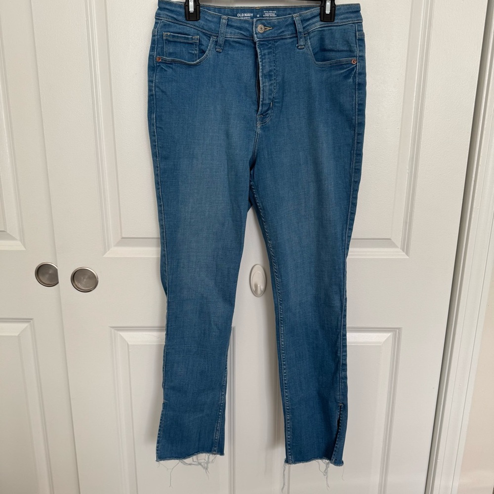 Old Navy Blue extra high rise, rockstar, super skinny jeans with slit hem
